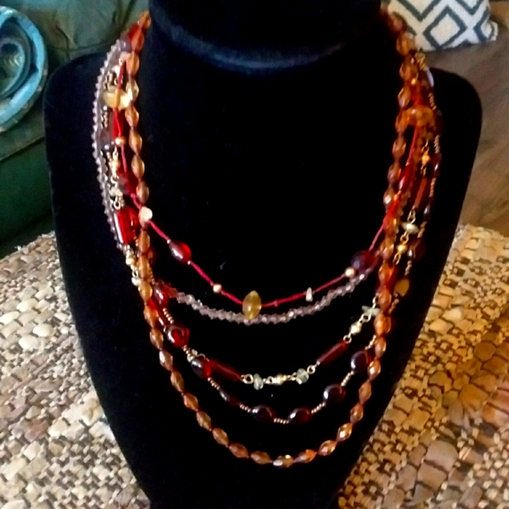 Vintage LC marked amber beads with earrings.  5 strands. 2" earrings.